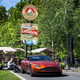 Illustration for article titled Chasing Canada's Greasiest People's Food In A $200,000 Aston Martin